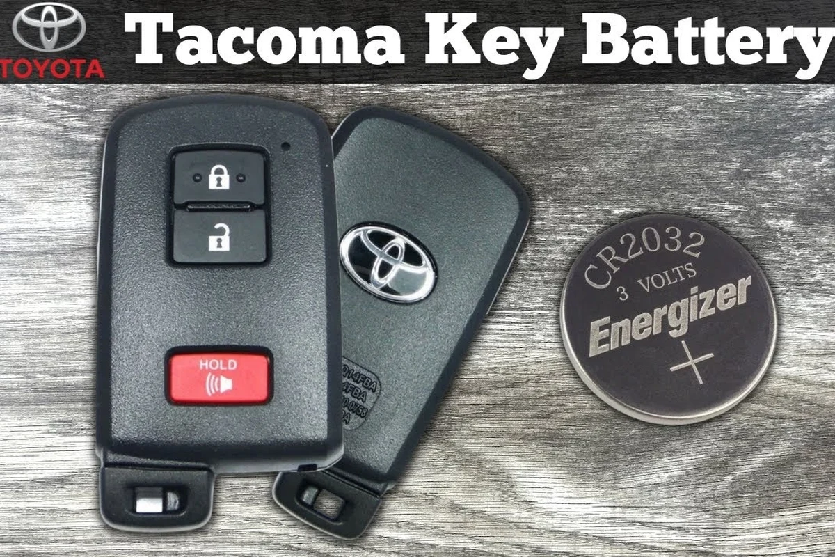 Toyota owner comparing a Bluetooth OBD2 adapter and handheld scanner beside a key fob
